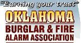Oklahoma City Burglar and Fire Logo